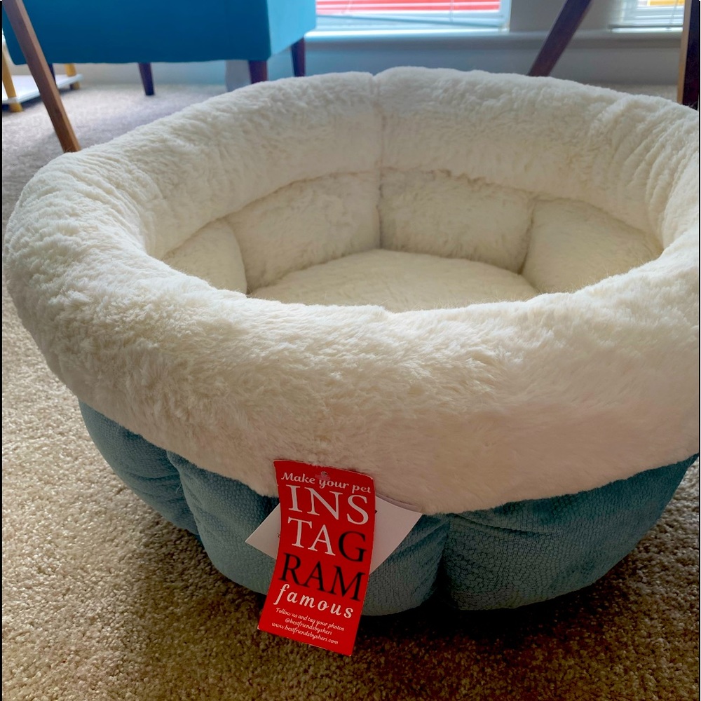 Pet bed for small dogs, puppies, or cats.